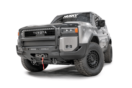 Fab Fours TL24-N6752-1 heavy duty front winch bumper with grille guard for 2024 Toyota Land Cruiser; features hidden winch mount and pre-runner guard