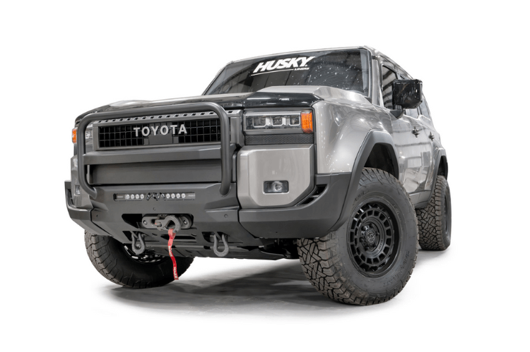 Fab Fours TL24-N6752-1 heavy duty front winch bumper with grille guard for 2024 Toyota Land Cruiser; features hidden winch mount and pre-runner guard