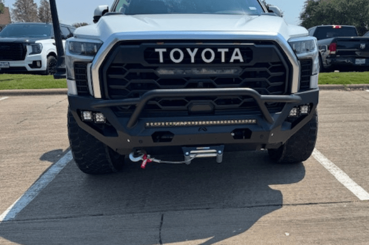 Front view of Fab Fours TT22-X5452-1 Matrix Front Bumper with Pre-Runner Guard, Winch Ready for Toyota Tundra 2022-2024