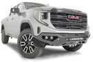 Silver GMC Sierra truck's front end showcasing the Fab Fours Vengeance bumper, model GS23-D5851-1, for 2022.5-2024