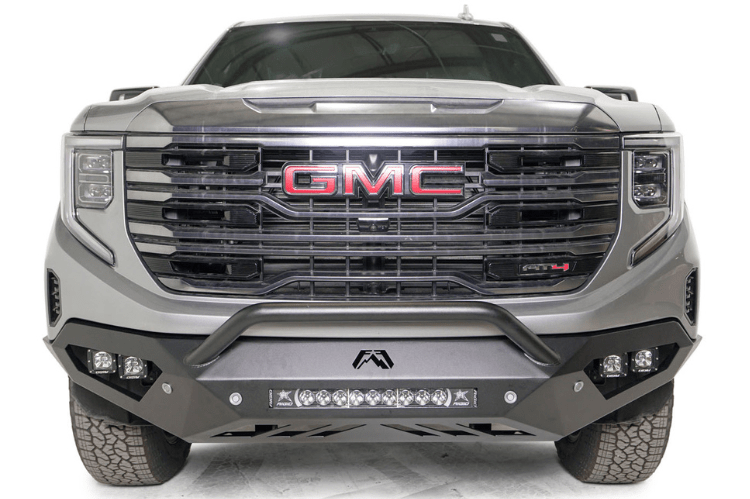 Silver GMC truck featuring Fab Fours Vengeance Front Bumper Pre-Runner Guard for GMC Sierra 1500 2022.5-2024