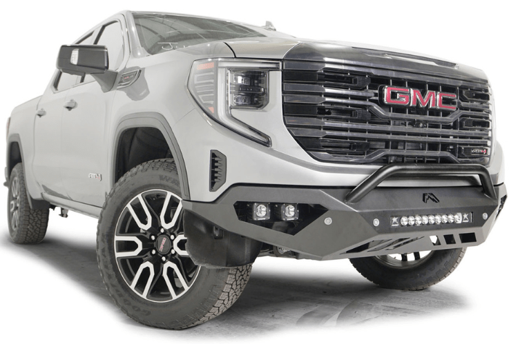 Silver GMC truck featuring Fab Fours Vengeance Front Bumper Pre-Runner Guard for GMC Sierra 1500 2022.5-2024