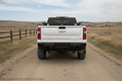 2023 Silverado 2500HD equipped with Hammerhead bumper, UWS toolbox, and Curt hitch — complete Heavy Hauler setup for towing and durability