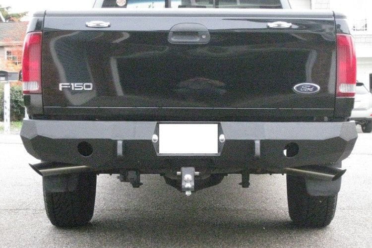 Aftermarket steel bumper #23 by Iron Bull offers maximum rear impact armor for a 1997-2003 Ford F150 off-road rig