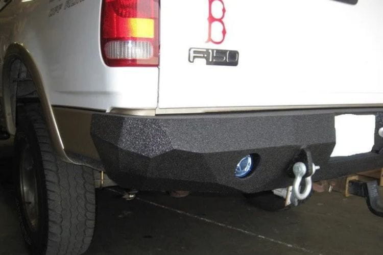Aftermarket steel bumper #23 by Iron Bull offers maximum rear impact armor for a 1997-2003 Ford F150 off-road rig