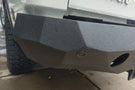 Aftermarket rear bumper #42 by Iron Bull is mounted on the back end of a 2004-2015 Nissan Titan pickup truck