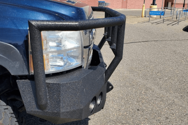 Iron Bull Heavy Duty Front Bumper installed on a Chevy Silverado 2500/3500 2007-2010, showcasing a durable Chevy Silverado front bumper design