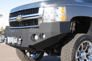 Iron Bull Heavy Duty Front Bumper installed on a Chevy Silverado 2500/3500 2007-2010, showcasing a durable Chevy Silverado front bumper design