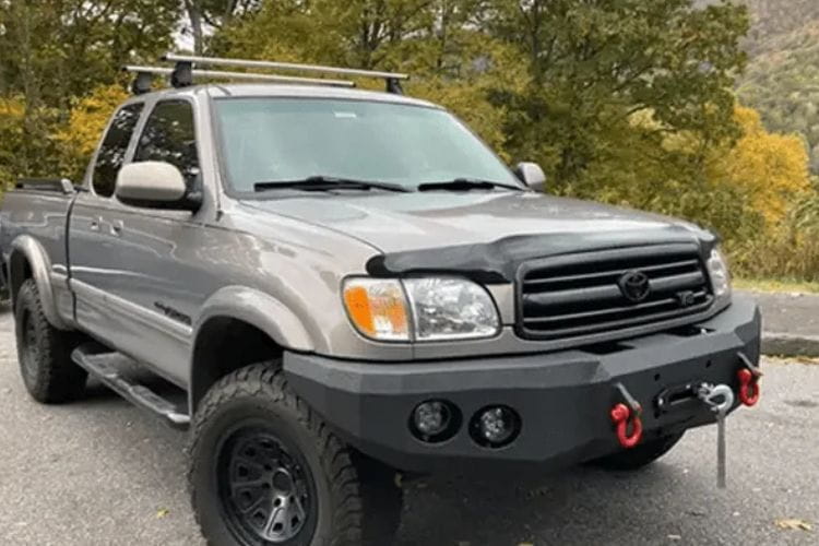 Custom truck front bumper #43 by Iron Bull sits installed on the front end of a 2000-2002 Toyota Tundra off-roader