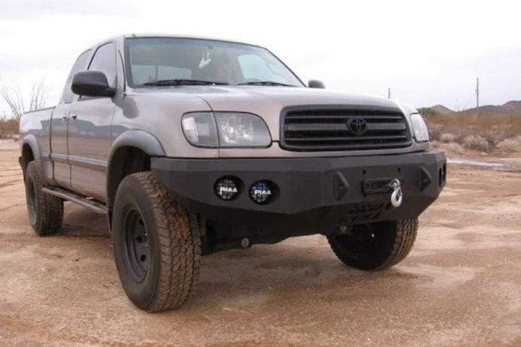 Custom truck front bumper #43 by Iron Bull sits installed on the front end of a 2000-2002 Toyota Tundra off-roader