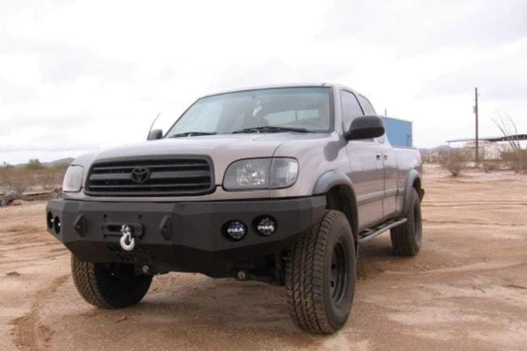 Custom truck front bumper #43 by Iron Bull sits installed on the front end of a 2000-2002 Toyota Tundra off-roader
