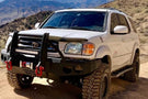 Custom truck front bumper #43 by Iron Bull sits installed on the front end of a 2000-2002 Toyota Tundra off-roader