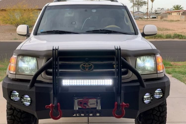Custom truck front bumper #43 by Iron Bull sits installed on the front end of a 2000-2002 Toyota Tundra off-roader