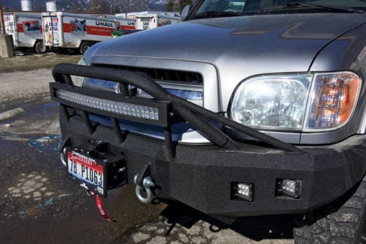 Custom truck front bumper #43 by Iron Bull sits installed on the front end of a 2000-2002 Toyota Tundra off-roader