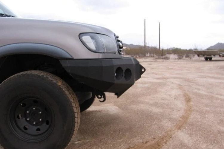 Custom truck front bumper #43 by Iron Bull sits installed on the front end of a 2000-2002 Toyota Tundra off-roader