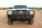 Iron Bull front bumper #14 equips a 1994-2002 Dodge Ram 2500/3500 with heavy-duty steel guard on rugged off-road trails