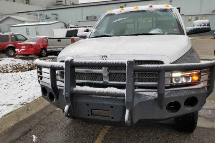 Iron Bull front bumper #14 equips a 1994-2002 Dodge Ram 2500/3500 with heavy-duty steel guard on rugged off-road trails