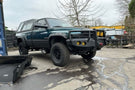 Iron Bull front bumper #14 equips a 1994-2002 Dodge Ram 2500/3500 with heavy-duty steel guard on rugged off-road trails