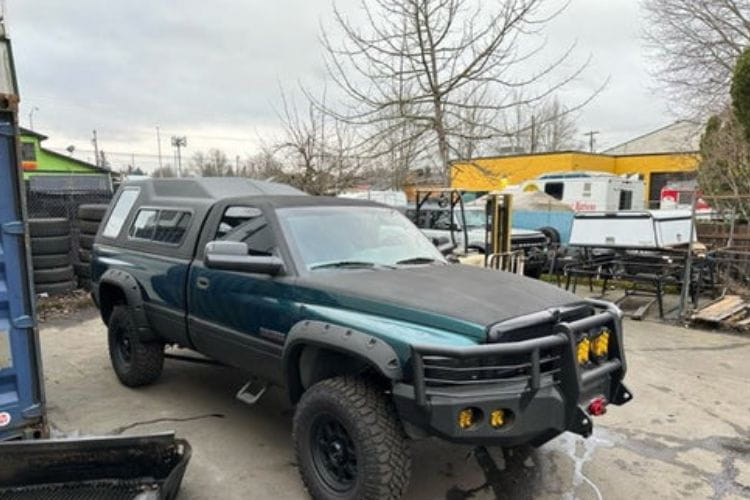 Iron Bull front bumper #14 equips a 1994-2002 Dodge Ram 2500/3500 with heavy-duty steel guard on rugged off-road trails