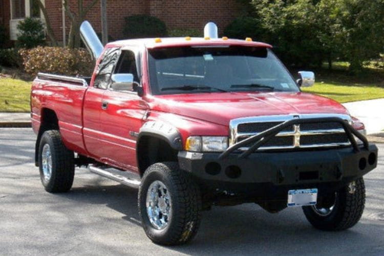 Iron Bull front bumper #14 equips a 1994-2002 Dodge Ram 2500/3500 with heavy-duty steel guard on rugged off-road trails