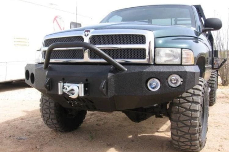 Iron Bull front bumper #14 equips a 1994-2002 Dodge Ram 2500/3500 with heavy-duty steel guard on rugged off-road trails