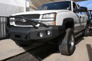 Iron Bull aftermarket front bumper for 2003-2007 Chevy Silverado 2500/3500, heavy-duty steel construction with bold upgrade design.