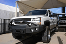 Iron Bull aftermarket front bumper for 2003-2007 Chevy Silverado 2500/3500, heavy-duty steel construction with bold upgrade design.