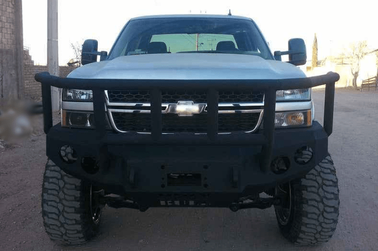 Iron Bull aftermarket front bumper for 2003-2007 Chevy Silverado 2500/3500, heavy-duty steel construction with bold upgrade design.