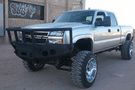 Iron Bull aftermarket front bumper for 2003-2007 Chevy Silverado 2500/3500, heavy-duty steel construction with bold upgrade design.