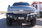 Iron Bull aftermarket front bumper for 2003-2007 Chevy Silverado 2500/3500, heavy-duty steel construction with bold upgrade design.