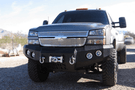 Iron Bull aftermarket front bumper for 2003-2007 Chevy Silverado 2500/3500, heavy-duty steel construction with bold upgrade design.