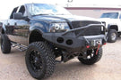 Heavy duty front bumper #21 by Iron Bull displays a black steel finish on a 2004-2008 Ford F150 rugged work truck 