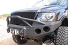 Heavy duty front bumper #21 by Iron Bull displays a black steel finish on a 2004-2008 Ford F150 rugged work truck 