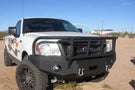 Heavy duty front bumper #21 by Iron Bull displays a black steel finish on a 2004-2008 Ford F150 rugged work truck 