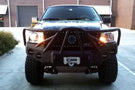 Heavy duty front bumper #21 by Iron Bull displays a black steel finish on a 2004-2008 Ford F150 rugged work truck 
