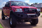 Heavy duty front bumper #21 by Iron Bull displays a black steel finish on a 2004-2008 Ford F150 rugged work truck 