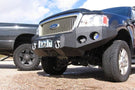 Heavy duty front bumper #21 by Iron Bull displays a black steel finish on a 2004-2008 Ford F150 rugged work truck 