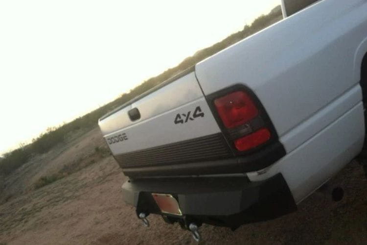 Iron Bull heavy duty rear bumpers #16 protect a 1994-2001 Dodge Ram 1500 truck with custom-built steel strength