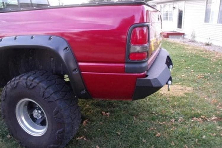 Iron Bull heavy duty rear bumpers #16 protect a 1994-2001 Dodge Ram 1500 truck with custom-built steel strength