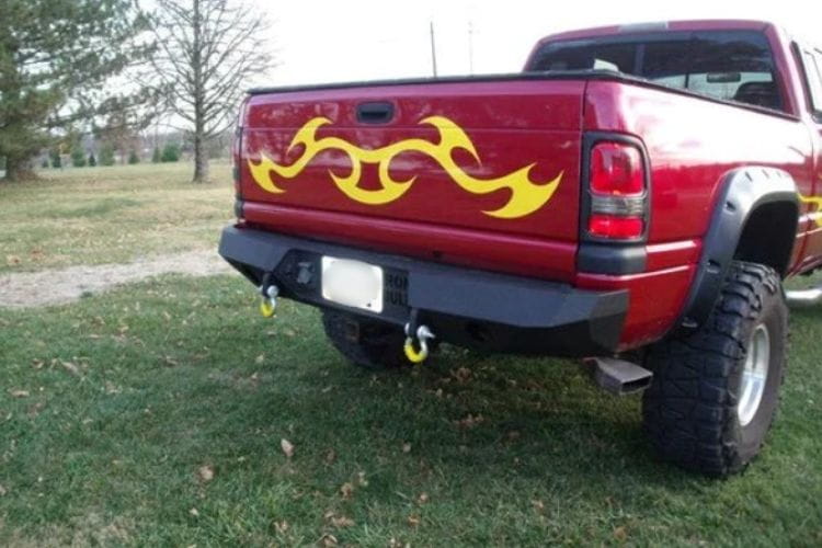 Iron Bull heavy duty rear bumpers #16 protect a 1994-2001 Dodge Ram 1500 truck with custom-built steel strength