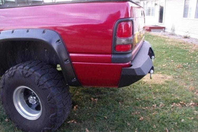 Heavy duty rear bumpers #16 made by Iron Bull enhance a 1994-2002 Dodge Ram 2500/3500 with rugged trail-ready protection
