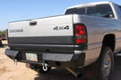 Heavy duty rear bumpers #16 made by Iron Bull enhance a 1994-2002 Dodge Ram 2500/3500 with rugged trail-ready protection