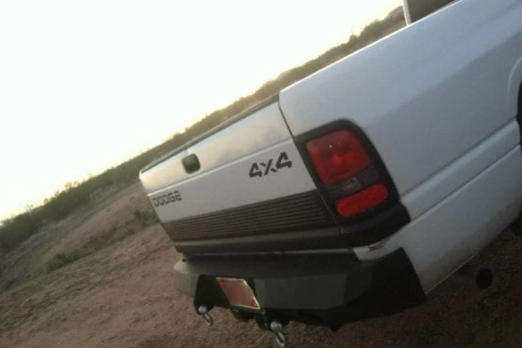 Heavy duty rear bumpers #16 made by Iron Bull enhance a 1994-2002 Dodge Ram 2500/3500 with rugged trail-ready protection