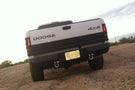 Heavy duty rear bumpers #16 made by Iron Bull enhance a 1994-2002 Dodge Ram 2500/3500 with rugged trail-ready protection