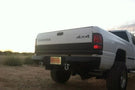 Heavy duty rear bumpers #16 made by Iron Bull enhance a 1994-2002 Dodge Ram 2500/3500 with rugged trail-ready protection
