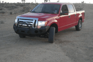Truck front bumper #15 from Iron Bull gives a 2009-2014 Ford F150 an imposing off-road stance on rough terrain