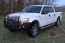 Truck front bumper #15 from Iron Bull gives a 2009-2014 Ford F150 an imposing off-road stance on rough terrain