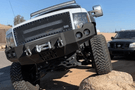 Truck front bumper #15 from Iron Bull gives a 2009-2014 Ford F150 an imposing off-road stance on rough terrain