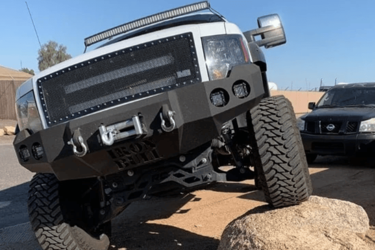 Truck front bumper #15 from Iron Bull gives a 2009-2014 Ford F150 an imposing off-road stance on rough terrain