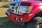 Truck front bumper #15 from Iron Bull gives a 2009-2014 Ford F150 an imposing off-road stance on rough terrain